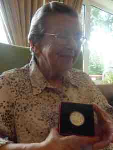 Betty Cole with medal